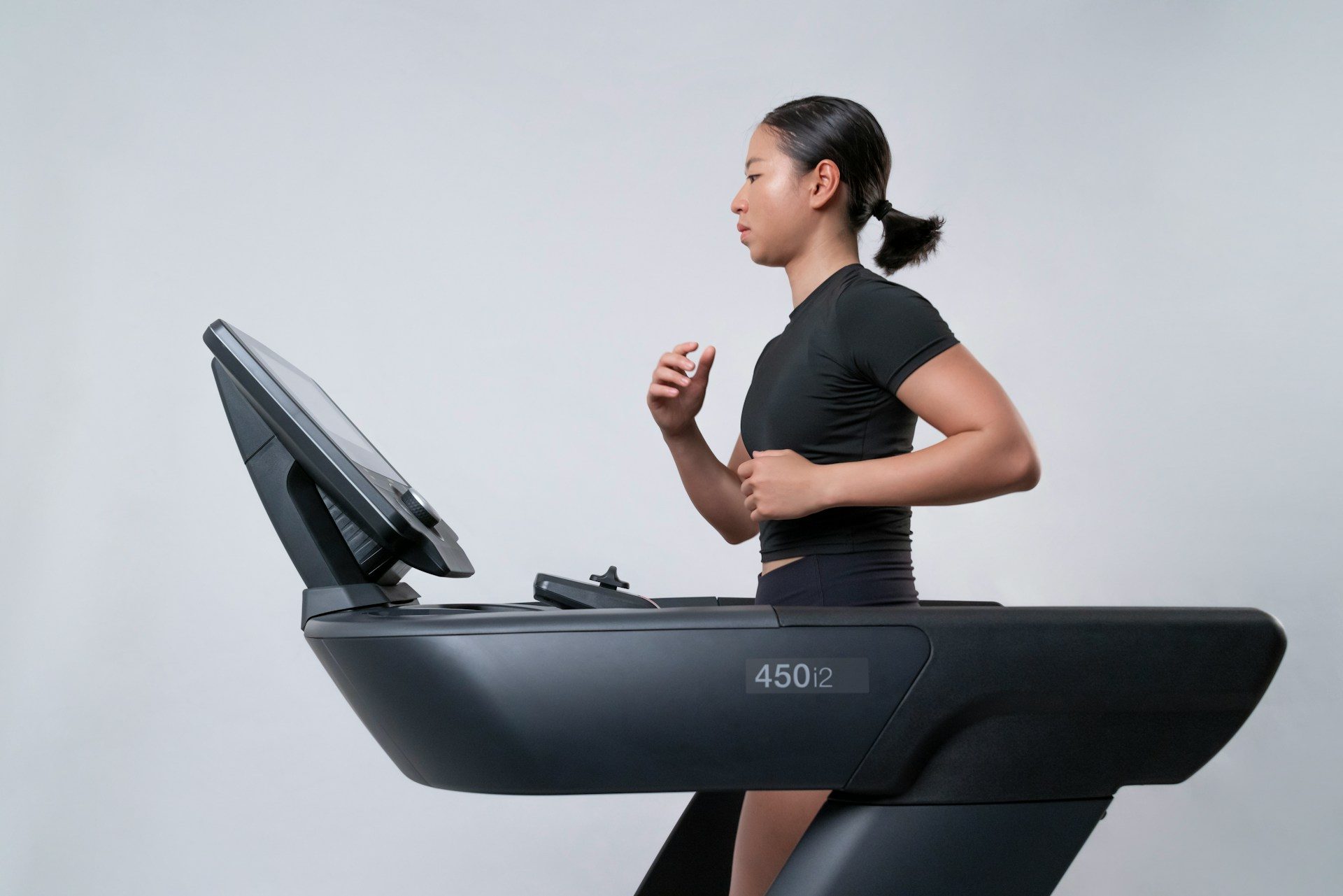 woman jogging on a treadmill