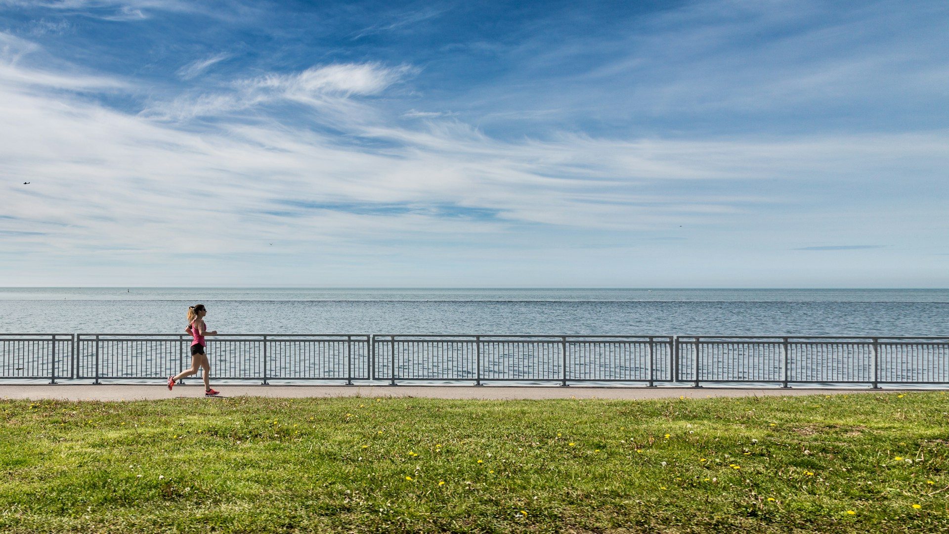 woman running near the beach