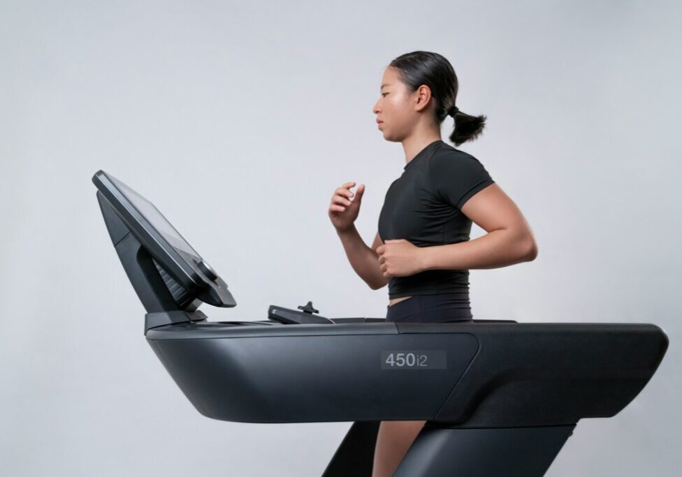 woman jogging on a treadmill