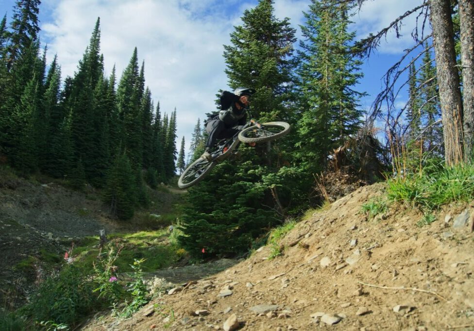 mountain biker doing a jump on the bike - best mountain bikes